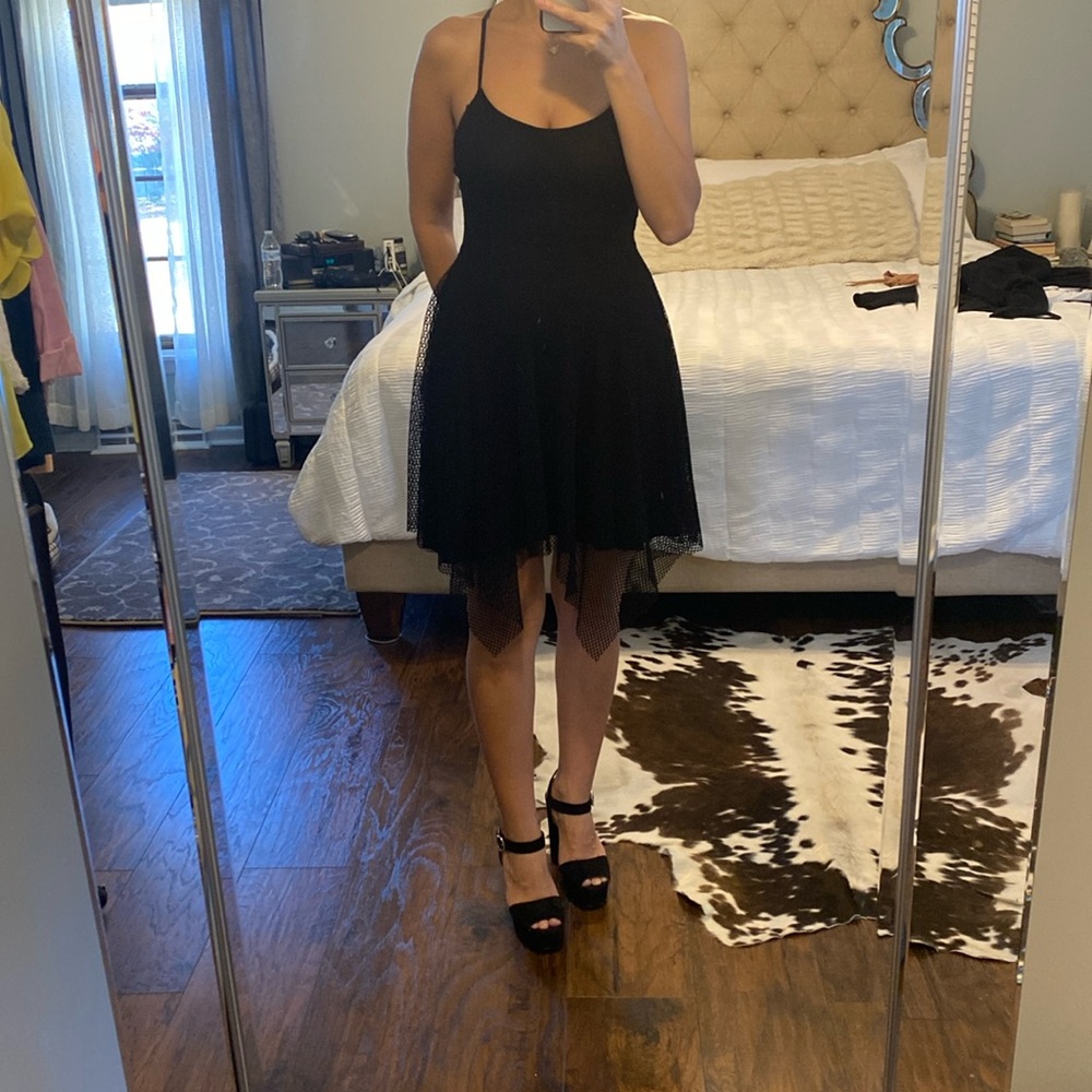 Brand new, no tags!! Really light and comfortable LBD.